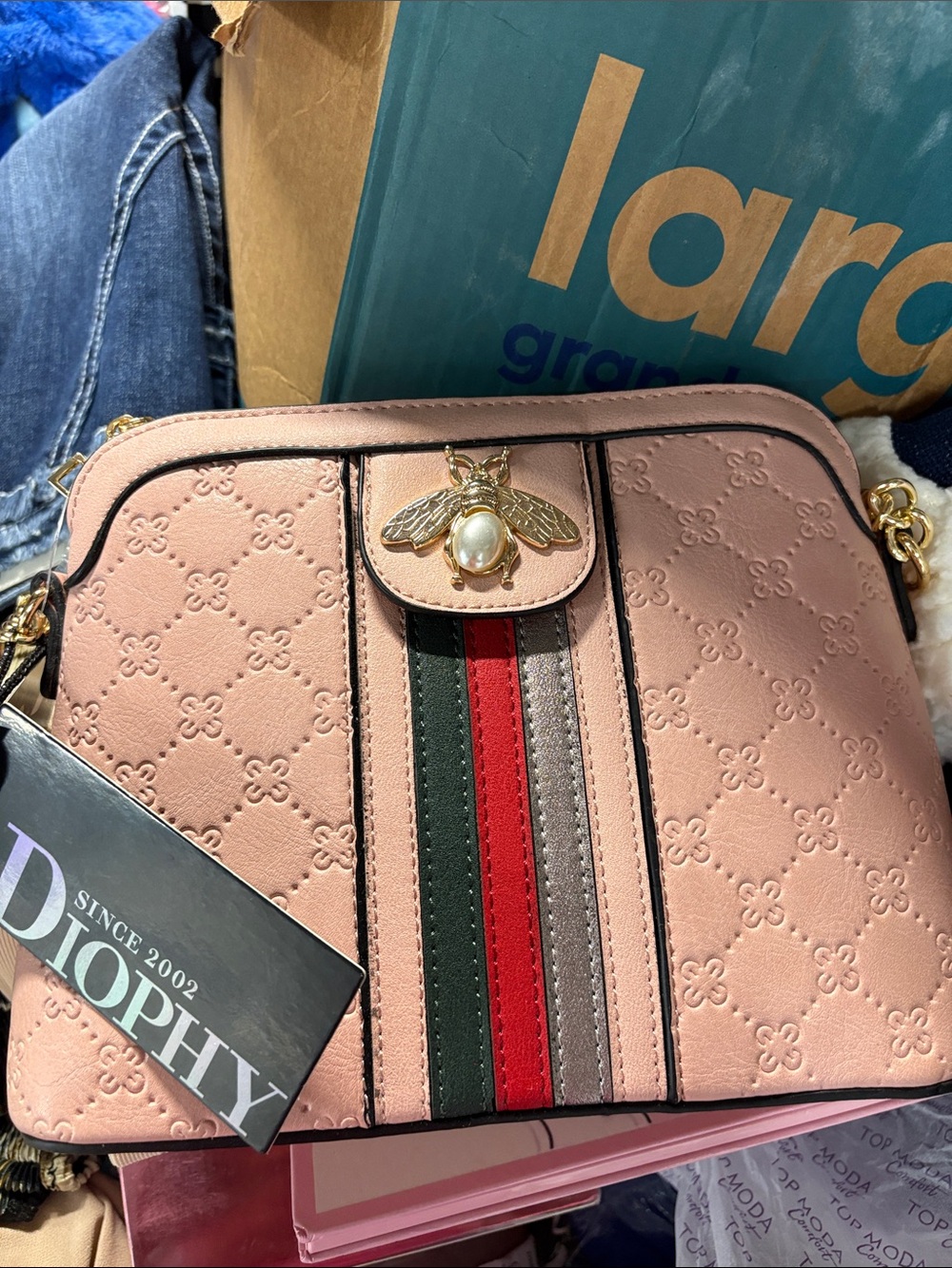 Pink Embossed Crossbody Bag with Striped Center and Bee Accent